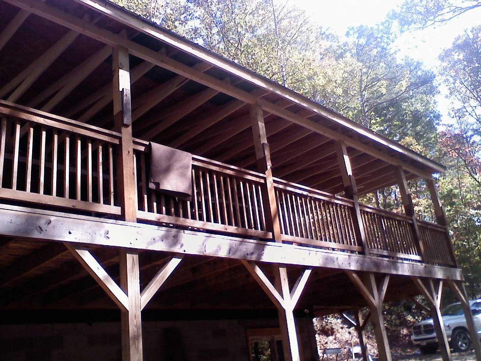 Timber framing under a new elevated porch and deck — Roof Leak Repair in South Thomaston by Roofing Brothers